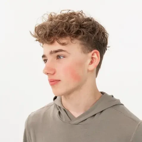 Boy with perm hair style