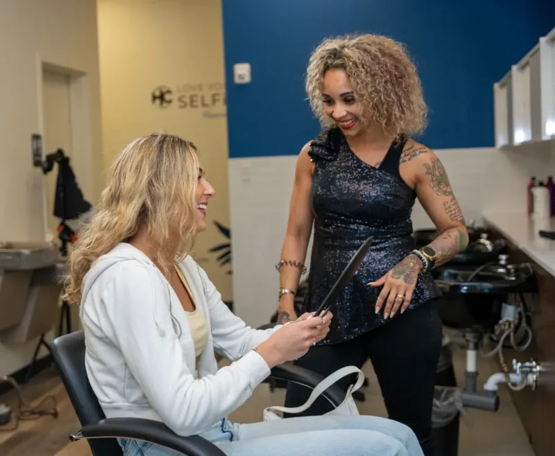 Stylist and guest talking