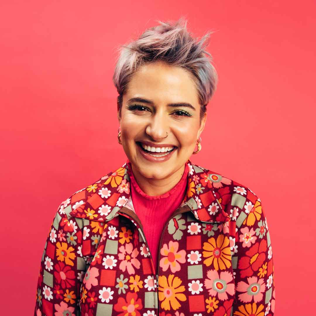 Woman with a low-maintenance short layered haircut showcasing a modern hairstyle